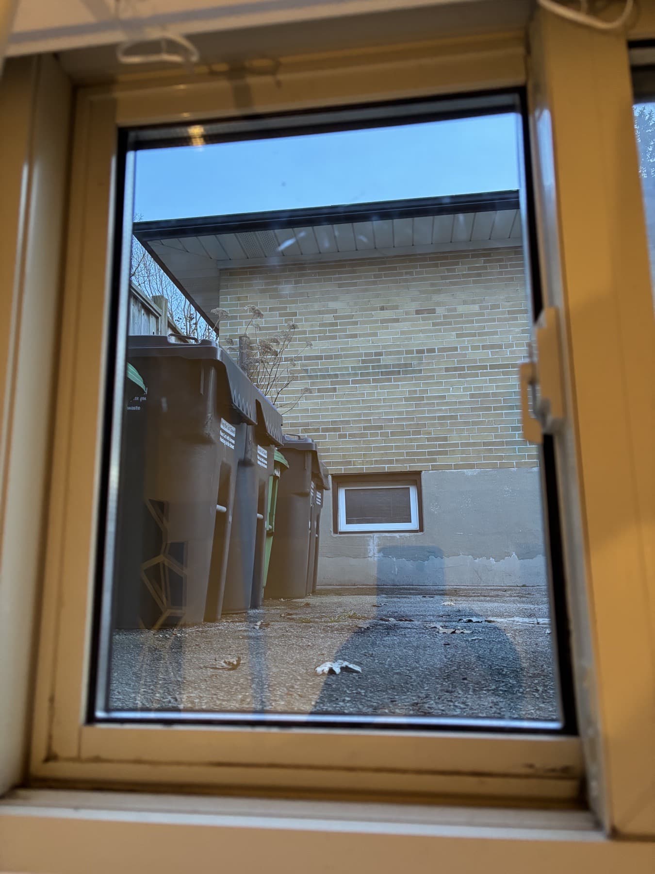 Basement window with clear replacement glass installed