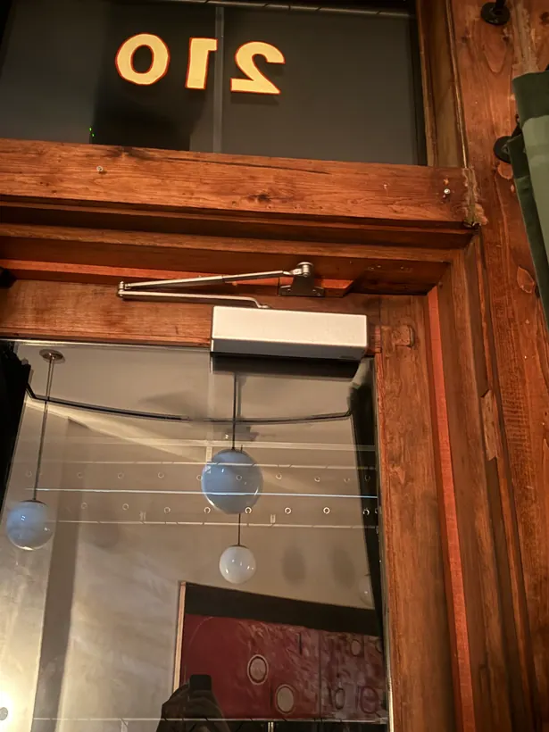Commercial entrance door closer in a customer photo