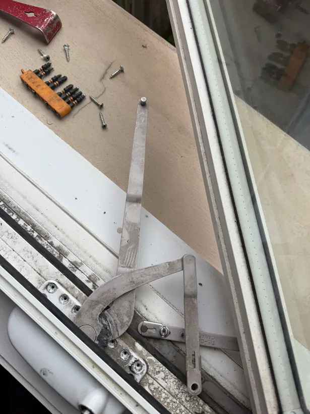 Disconnected window crank mechanism before repair